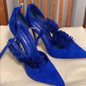 Woman’s blue heels